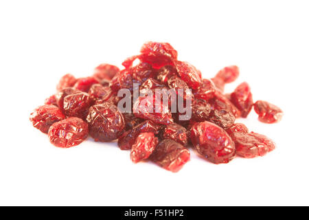 A pile of dried, cranberries, isolated on white background Stock Photo