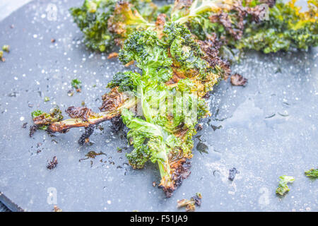 Deep fried kale, on a stone plate Stock Photo