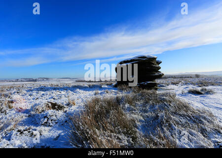 January, winter snow, the Eagle Stone on Baslow Edge; Derbyshire County; Peak District National Park; England; UK Stock Photo