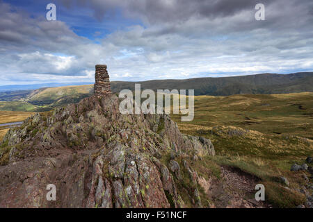 Summer, Summit cairn and OS Trig Point on Place Fell, Hartsop, Lake District National Park, Cumbria County, England, UK. Stock Photo