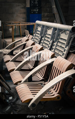 Four abandoned dirty bench of seats with dust Stock Photo