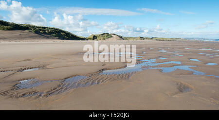 Rippled sand and sea water on a beach at low tide. Scremerston, Berwick Upon Tweed, Northumberland, England. Stock Photo