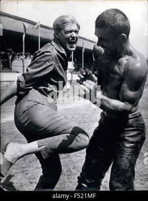 1972 -  The slippery wrestlers play in Miss Mercouri's latest film ''Topkapi'' Melina meets a slippery customer. The wrestlers of Kirkpina.: Popular screen star Melinina Mercouri has a spot of fun with a Turkish wrestler - during the traditional Kirkpinar Wrestling Games - in Turkey. These games are repeated every year - and the wrestlers who take part - cover their bodies with Olive Oil before starting each tournament. (Kirpinar is the name of the place in Turkey where the games are held means Forty Fountains) (Credit Image: © Keystone Pictures USA/ZUMAPRESS.com) Stock Photo