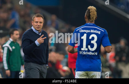 Schalke coach Andre Breitenreiter (l) gives instructions to Schalke's Eric Maxim Choupo-Moting (r) during the Europa League Group K football match between FC Schalke 04 and Sparta Prague at the Veltins Arena in Gelsenkirchen, Germany, 22 October 2015. PHOTO: GUIDO KIRCHNER/DPA Stock Photo