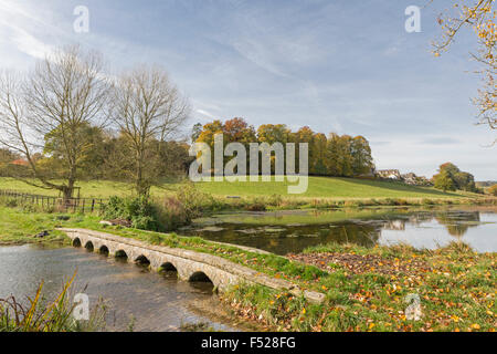 Autumn on the River Windrush near the Cotswold village of Sherbourne, Gloucestershire, England, UK Stock Photo