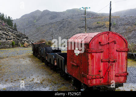 Old red rail wagon part of exhibit at Llechwedd Slate Caverns Blaenau Ffestiniog Gwynedd North Wales UK Stock Photo