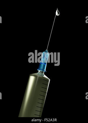 Syringe with some medcine isolated on black background Stock Photo