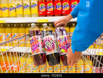 Fizzio and Dr, Fizz fizzy carbonated juice drinks in shopping trolley in Tesco supermarket. UK Stock Photo