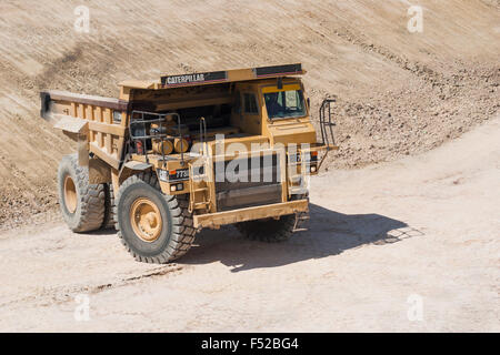 Yellow mining truck at work site Stock Photo