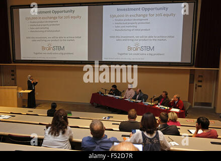 Las Cruces, NM, USA. 23rd Oct, 2015. Rajaa Shindi, left, delivers the presentation of her start-up BrainSTEM to local ''sharks'' and the public during the Aggie Shark Tank event at New Mexico State University in Las Cruces, N.M., Friday, Oct. 23, 2015. © Andres Leighton/Albuquerque Journal/ZUMA Wire/Alamy Live News Stock Photo