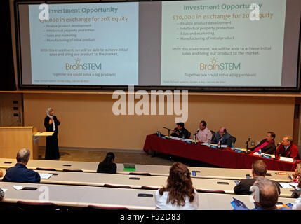 Las Cruces, NM, USA. 23rd Oct, 2015. Rajaa Shindi, left, delivers the presentation of her start-up BrainSTEM to local ''sharks'' and the public during the Aggie Shark Tank event at New Mexico State University in Las Cruces, N.M., Friday, Oct. 23, 2015. © Andres Leighton/Albuquerque Journal/ZUMA Wire/Alamy Live News Stock Photo