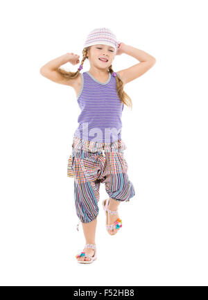 Little Girl in Bright Dress Dancing, on white background Stock Photo