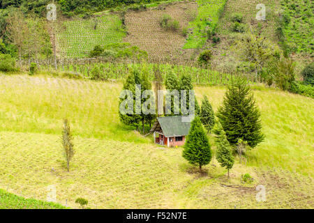 Small Farmhouse In The Ecuadorian Highlands Of Andes Mountain High Point Of View Stock Photo