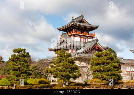 Japan, Kyoto, Fushimi castle, also known as Momoyama castle. Built as a Castle Entertainment Park in 1964. Castle yagura, turret with Japanese trees. Stock Photo