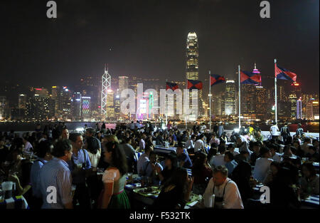 Hong Kong, China. 26th Oct, 2015. Customers attend a beer festival in the Marco Polo Hongkong Hotel in Hong Kong, south China, Oct. 26, 2015. The 24th Marco Polo German Beerfest was held in Hong Kong from Oct. 16 and it will last 23 days, featuring German beer, food and performances. Credit:  Li Peng/Xinhua/Alamy Live News Stock Photo