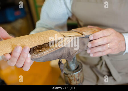 Experienced shoemaker Stock Photo