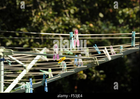 Clothes pegs on washing line Stock Photo