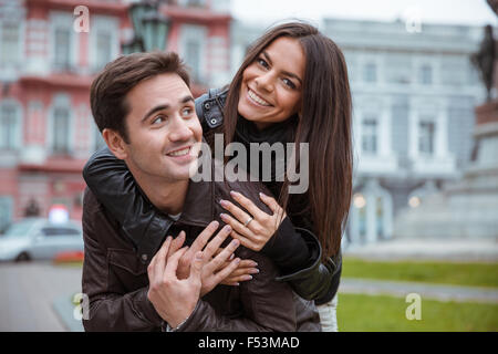 Portrait of a happy romantic couple traveling in old european city Stock Photo