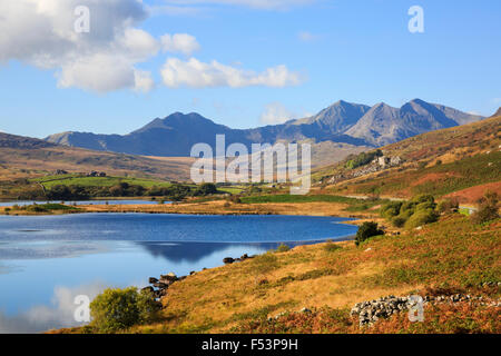 View to Mount Snowdon horseshoe across Llynnau Mymbyr lakes in Snowdonia National Park (Eryri) in autumn. Capel Curig, North Wales, UK Stock Photo