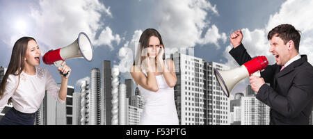 Businessman and woman with loudspeaker Stock Photo