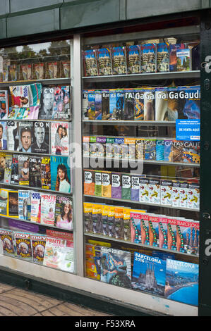 Magazines and tourist guide books at newsagents stall on La Rambla in Barcelona Catalonia Spain ES Stock Photo