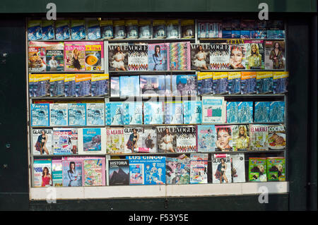 Magazines and tourist guide books at newsagents stall on La Rambla in Barcelona Catalonia Spain ES Stock Photo