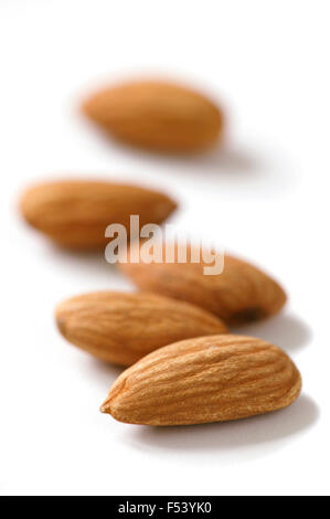 group of almonds without shells on white background Stock Photo - Alamy