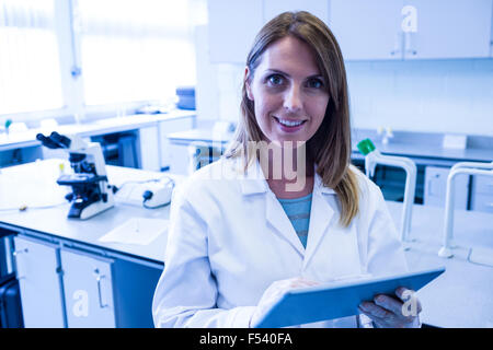 Scientist working in the laboratory with tablet Stock Photo