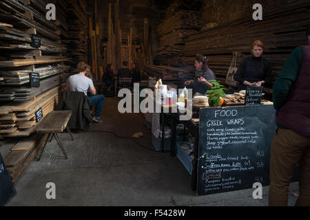 UK lifestyle: Inside a street sellers restaurant at the trendy and bustling Maltby Street market, London, SE1 Stock Photo