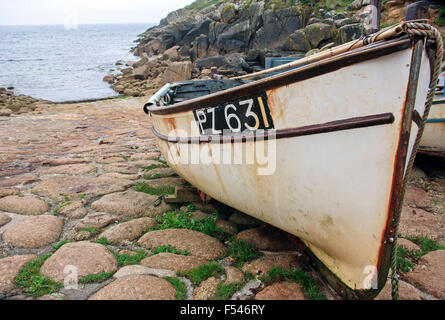 Fishing boat in Penberth hamlet near Penzance in Cornwall on cobbled slipway to sea Stock Photo