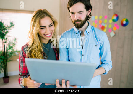 Creative team working with laptop Stock Photo