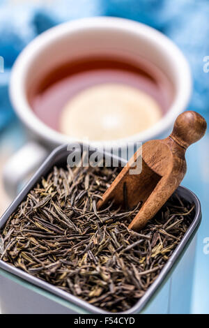tea can with tea cup Stock Photo - Alamy