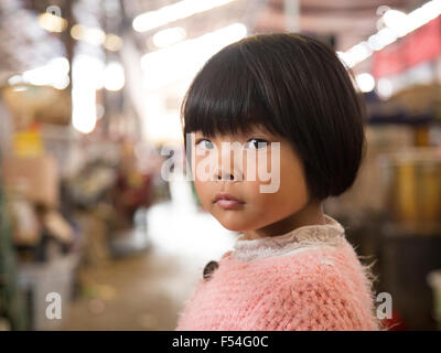 Portrait of Asian girl in a market in Shangri-La in Yunan, China Stock Photo