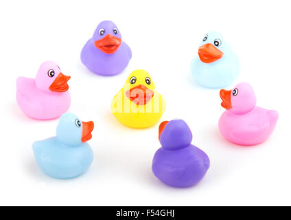 Group of rubber ducks talking together - concept of being friends and including everyone - focus on yellow duckling Stock Photo