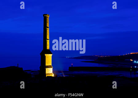 The Candlestick, floodlit at night, overlooking the harbour, Whitehaven, Cumbria, England UK Stock Photo