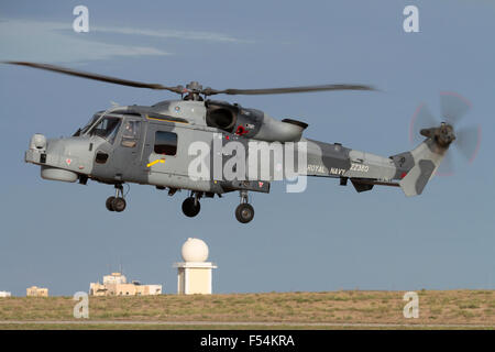 AgustaWestland AW159 Wildcat HMA2 military helicopter of Britain's Royal Navy hovering in the air Stock Photo