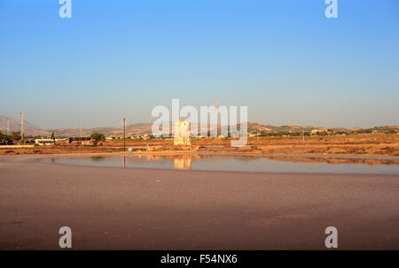 View of windmill in the salt pans, Trapani. Sicily Stock Photo