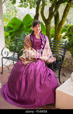 Tour guide in historic costume at Oak Alley plantation antebellum mansion house by Mississippi at Vacherie, Louisiana, USA Stock Photo