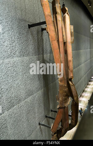 Impact steel from North Tower floors 96-99 exhibit at 9/11 Memorial Museum, The World Trade Center, New York USA Stock Photo