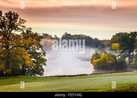 Sunrise over the lake on the Bowood estate in Wiltshire. Stock Photo