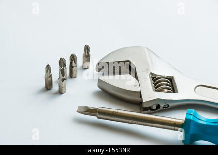 Spanner and screwdrivers on the white background Stock Photo
