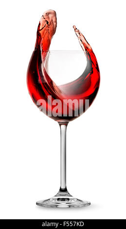 Elegant red wine splashing in wineglass isolated on white Stock Photo