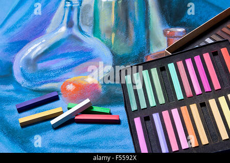 Artists chalk pastels and original pastel drawing of still life on the background. Stock Photo