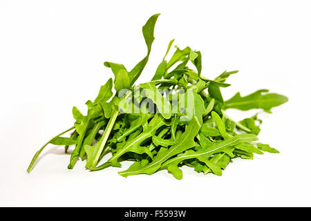 Fresh rucola lettuce isolated on white background Stock Photo