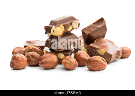 sweet chocolate with hazelnuts on white background Stock Photo
