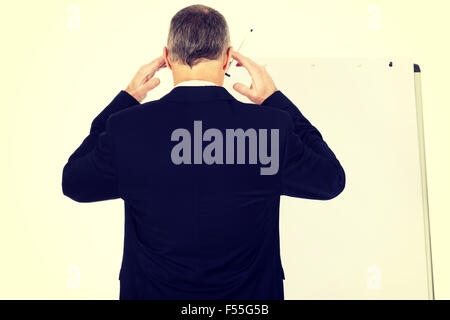 Male executive thinking about presentation Stock Photo