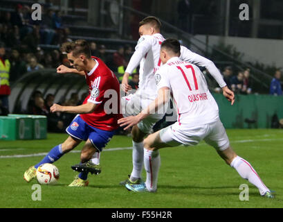 Muenchen, Bavaria, Germany. 27th Oct, 2015. from left Maximilian BAUER (Unterhaching), Nils QUASCHNER (Leipzig), .DFB Cup, 2nd main round.SpVgg Unterhaching vs RasenBallSport Leipzig.Unterhaching, Alpenbauer Sportpark, Germany, October 27th, 2015, .the former first league team of Unterhaching, now forrth league, receives the ambitious team of Leipzig, supported by Red Bull. Finally Unterhaching wins 3 : 0, Credit:  Wolfgang Fehrmann/ZUMA Wire/Alamy Live News Stock Photo