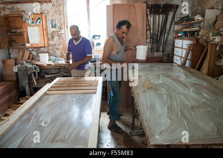 Two carpenters working in workshop Saidon Lebanon Stock Photo