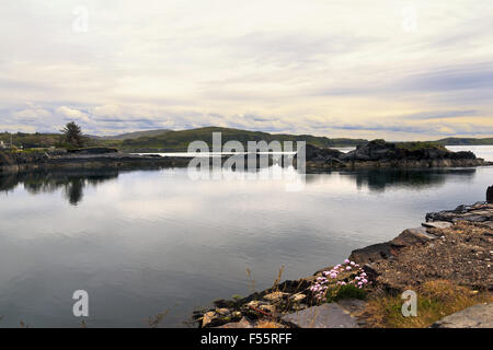 Ellenabeich on the Isle of Seil separated from the mainland by the Firth of Lorn Stock Photo