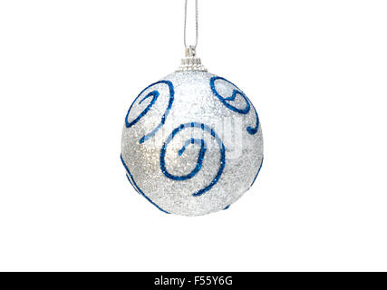 Christmas silver ball with blue isolated on white background. Selective focus on the top Stock Photo